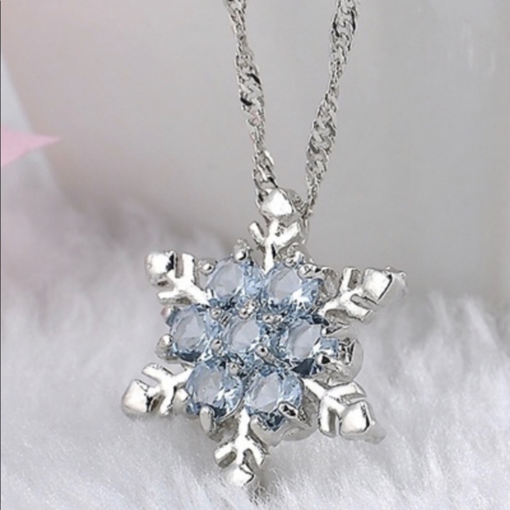 Silver Blue crystal snowflake necklace.